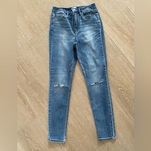 Calvin Klein blue slim jeans with rips on knees!! Size 29!!  Style # 42YA72F